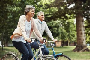 Cropped shot of a mature couple enjoying a bike ride in the park