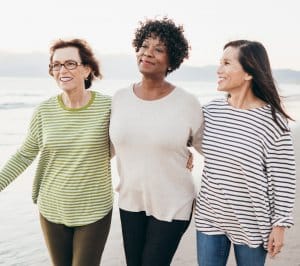 Three female friends walking