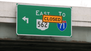 Sign showing St. Rt. 562 will close for construction.