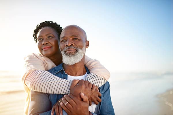 Shot of a mature couple enjoying some quality time together at the beach